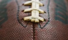An image of a Wilson football, similar to those used under NFL standards. Photo used with permission from Dave Adamson via Unsplash.