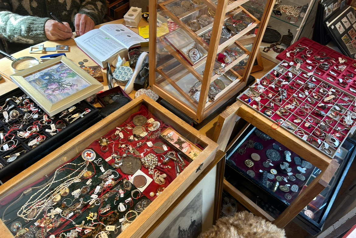 Isabella Phillips ('27) makes it a point to go thrifting wherever she travels: the photo above shows one of her finds – a jewelry spread at a German thrift shop.