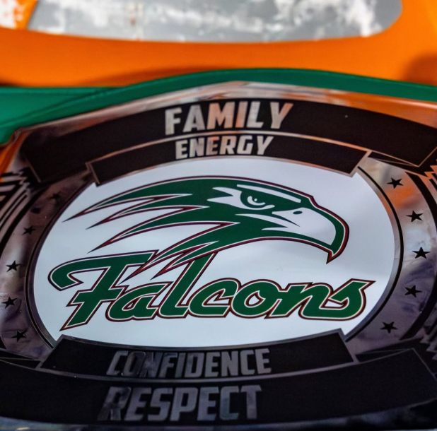 Coach Johnson does his best to instill values of confidence and discipline into his players and students. Photo used with permission from @greenhopefalcons on Instagram. 
