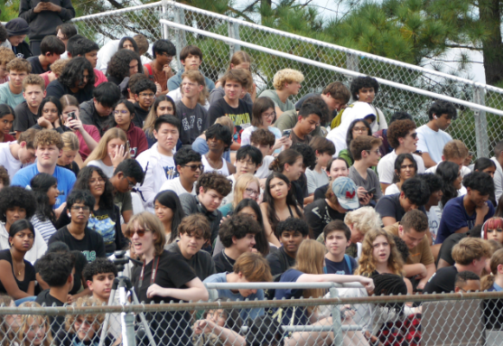Students celebrate their pep rally at the Green Hope Stadium.
