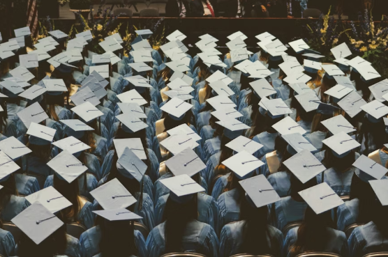 Seniors gather at their graduation ceremony. Photo used with permission from Joshua Hoehne on Unsplash.