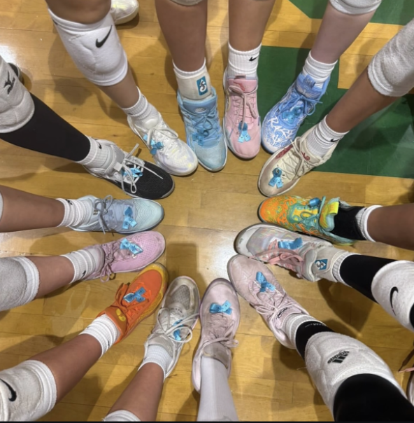 Green Hope athletes wear blue on their shoes to highlight the efforts of Morgan's Message. 