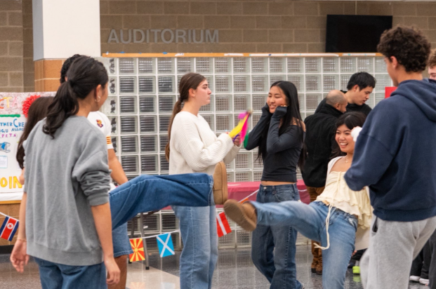 Green Hope students had the opportunity to participate in cultural activities provided by volunteers who ran the booths.