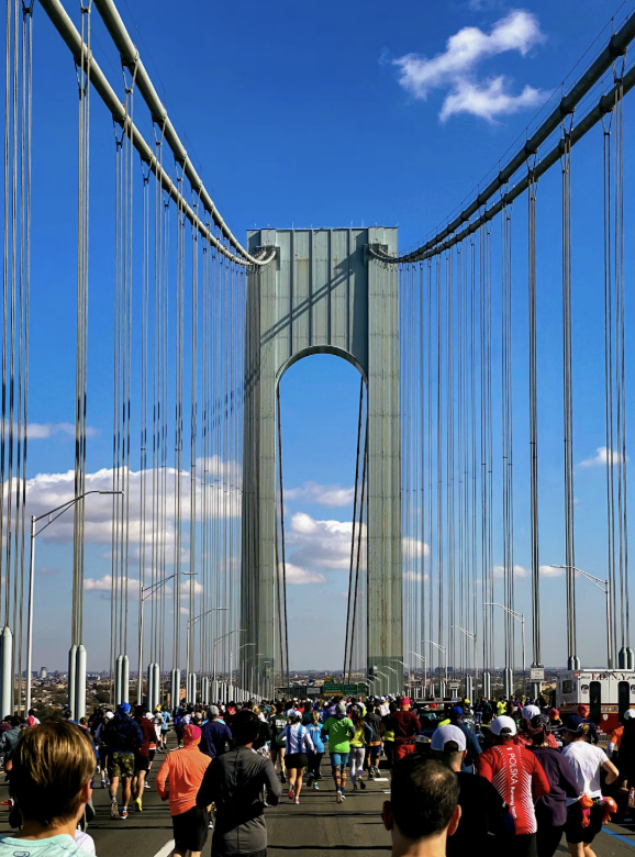  A crowd of people - both men, women, & young children -  race at the New York City Marathon. Used with permission from Evan Buchholz via Unsplash.