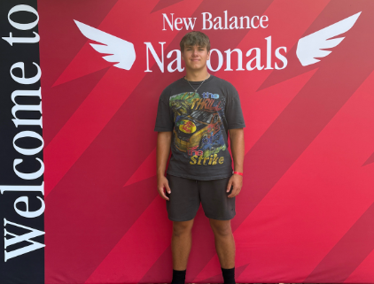 Kyle Richards posing for a picture at the New Balance Nationals track as a freshman. Photo used with permission from Kyle Richards.