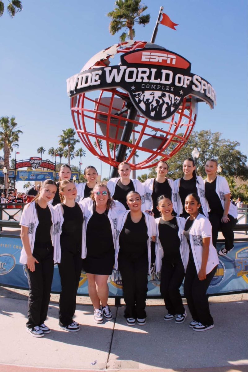The dance team poses in front of the ESPN Wide World of Sports complex, where they performed both of their dances. Picture used with permission from Kaylee Winans.