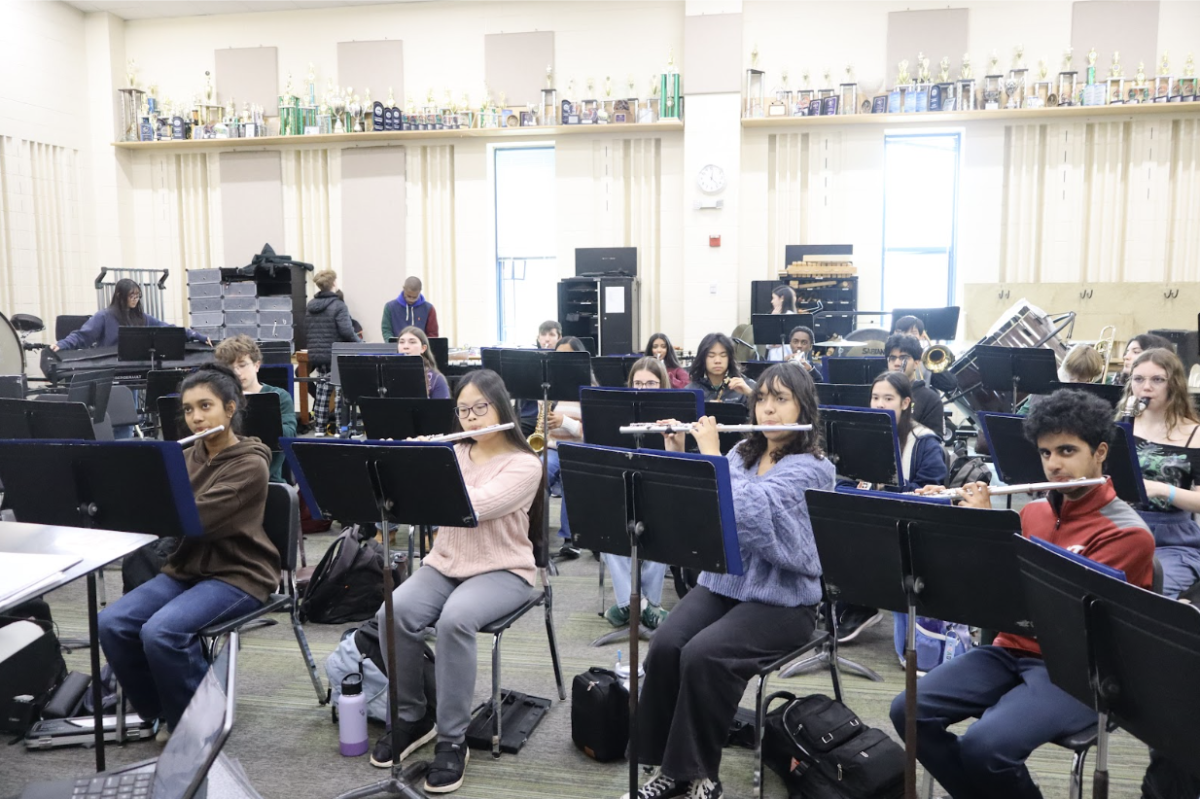  The Green Hope Band is practicing its music for the upcoming concert. 
