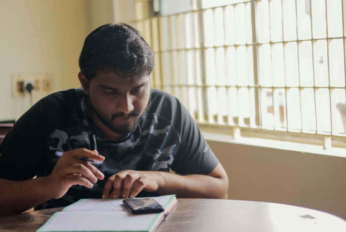 Many people are easily distracted by their phones when working. Photo used with permission of Athul Krishna on Unsplash. 