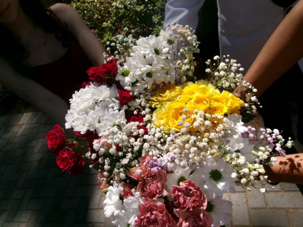 Florals? For spring? Groundbreaking. Many prom-goers created bouquets to match their outfits. Photo used with permission from Sarah George ('26).
