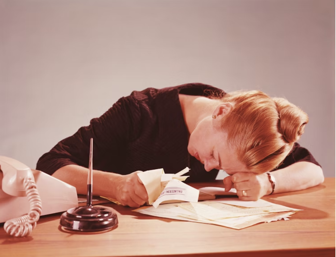 A woman appears stressed while doing work, an area where ADHD tends to affect people, specifically students. Photo used with permission from Getty Images via Unsplash. 