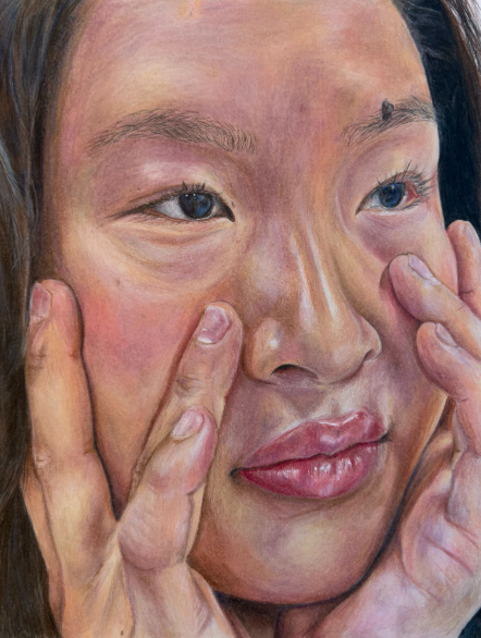 Angelina Lu’s “Introspection” captures the emotional impact of self-perception through a realistic self-portrait. Photo used with permission from Angelina Lu.
