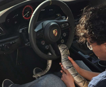 Green Hope Senior, Ethan Nadal (‘26), larps ownership of a highly valued Porsche GT3 RS and even a snake. Photo used with permission from Ethan Nadal.
