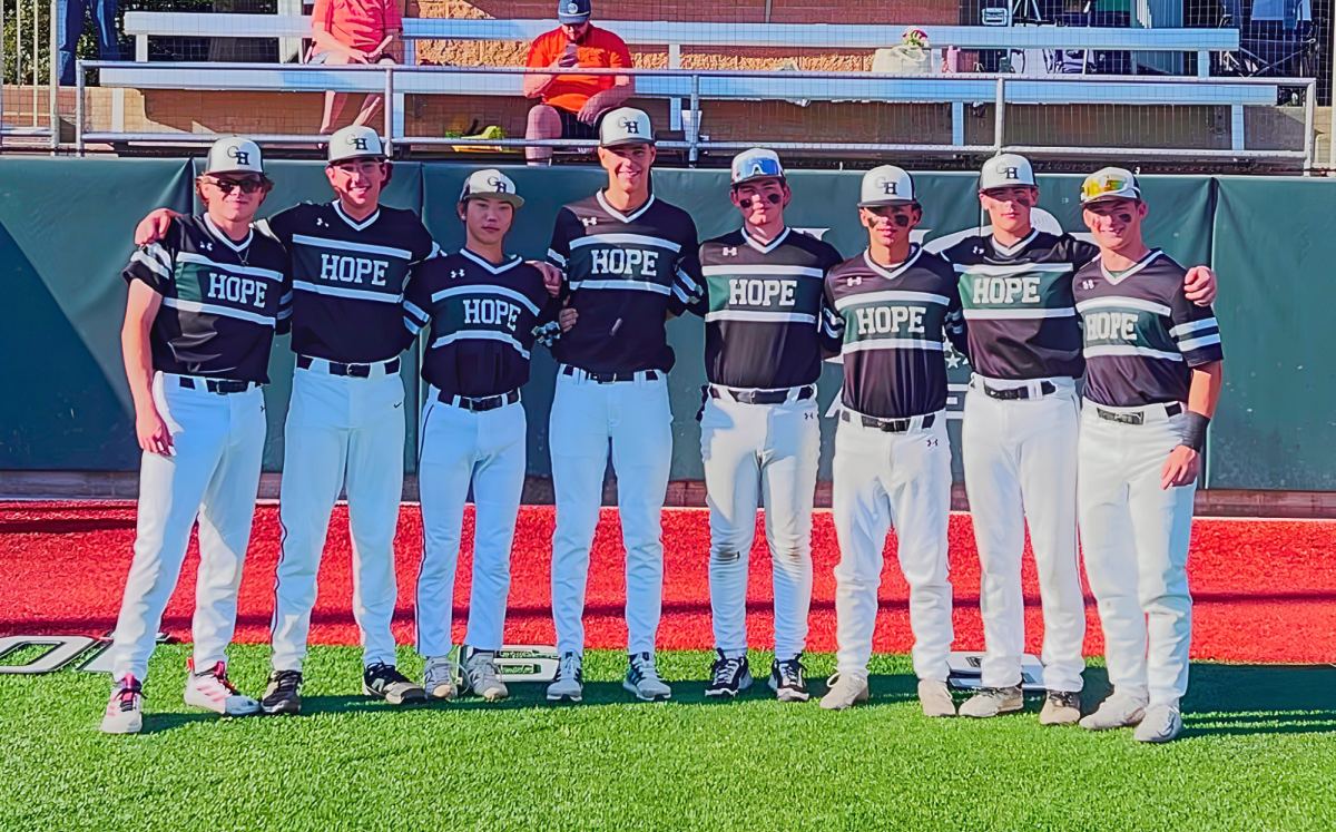 Image of the senior class together during pregame ceremonies. People shown in the photograph from left to right: Blake Vestal, Rocco Ciccolini, Ryu Fukuyama, Jackson Wall, CJ Valerio, PJ Barry, Jayson DeSantis, and Patrick Davis. Photo used with permission by @greenhopeatc on Instagram.