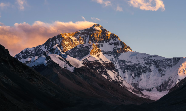 Many describe Everest's beauty as breathtaking, climbers often state they feel “a sense of relief" rather than pure joy when summiting the beast. Photo used with permission from Weichao Dang on Unsplash.
